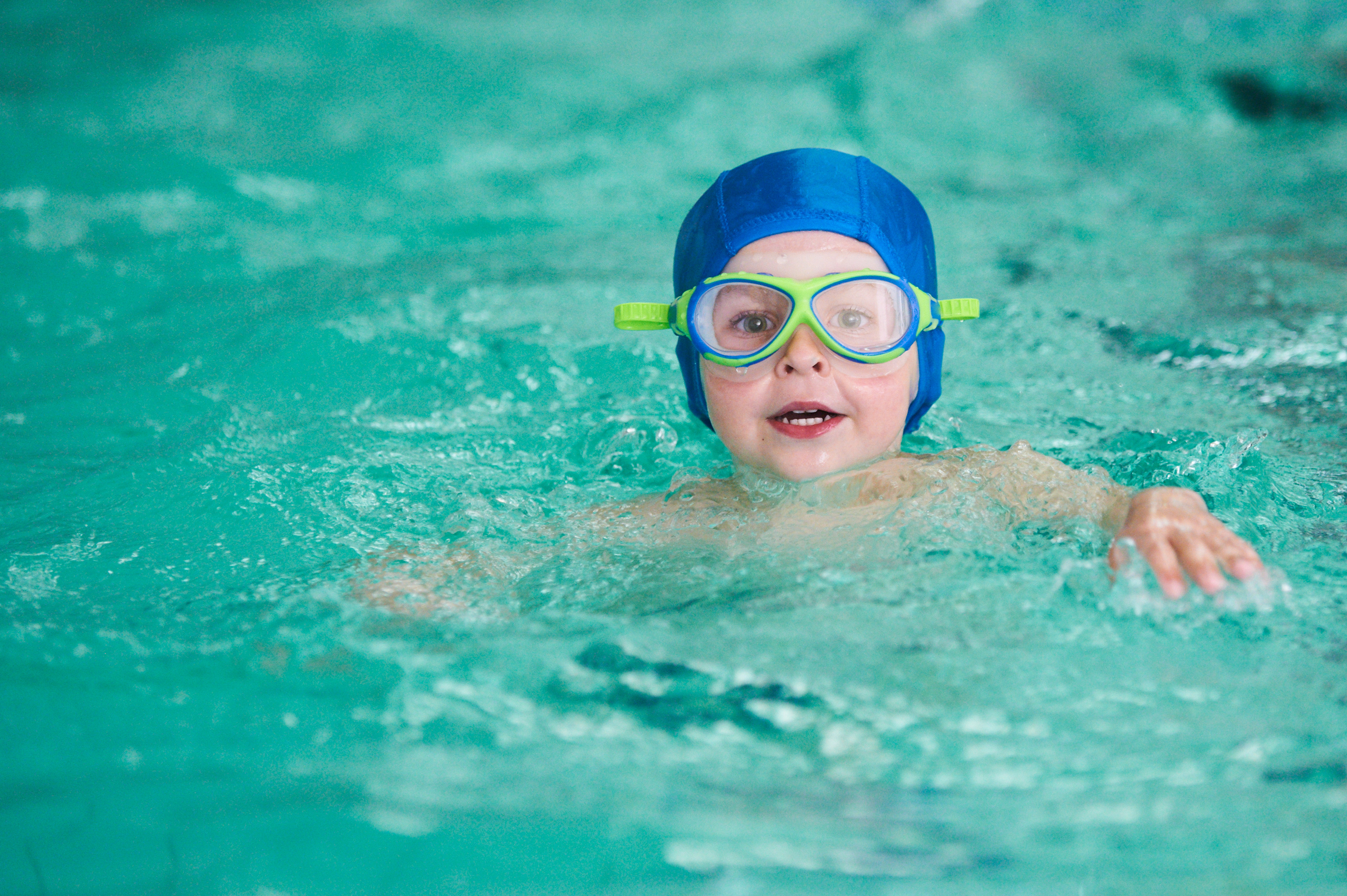 young swimmer in swimming pool